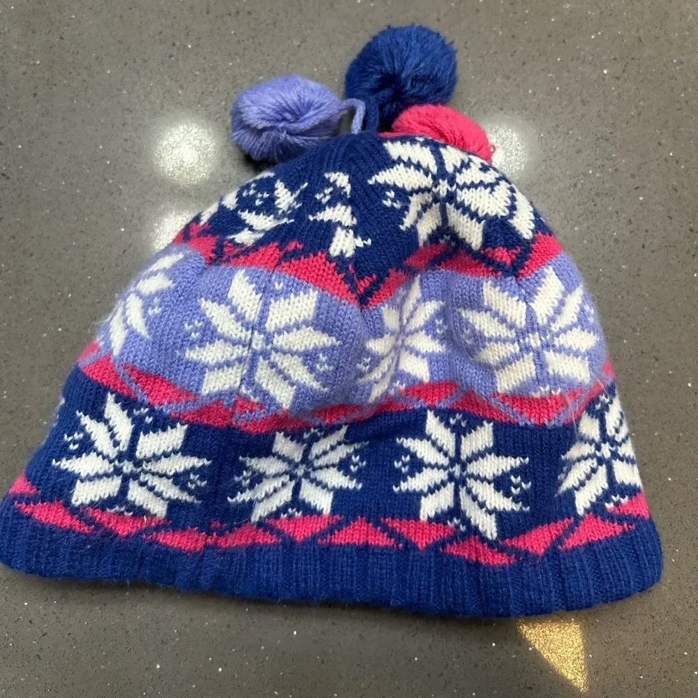 L.L.Bean Kids' snowflake pom hat in blue, pink, and white knit